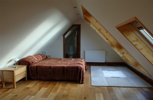 Bathroom and bedroom in loft conversion