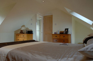 Bathroom and bedroom in loft conversion